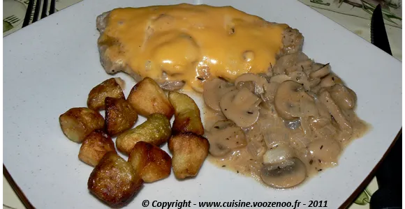 Côtes de porc au fromage fondant et champignons