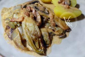 Poêlée d'endives crémeuses aux champignons slider