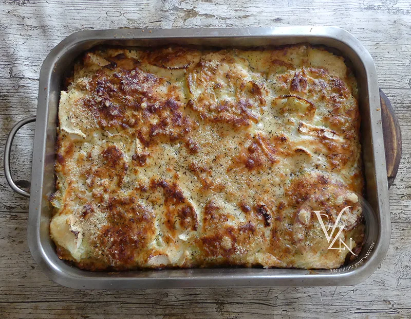 Gratin de ravioles au chèvre, oignons et parmesan fin